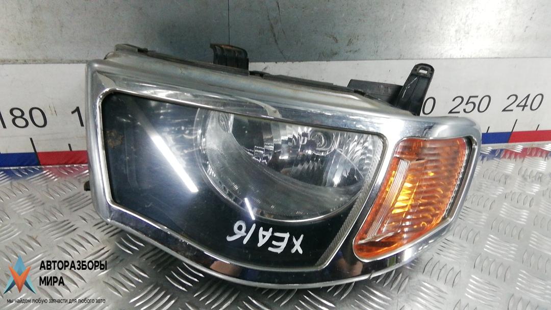 фара левая Mitsubishi L200 4 поколение 2006, 2.5 л., дизель, МКПП, пикап - фото №1