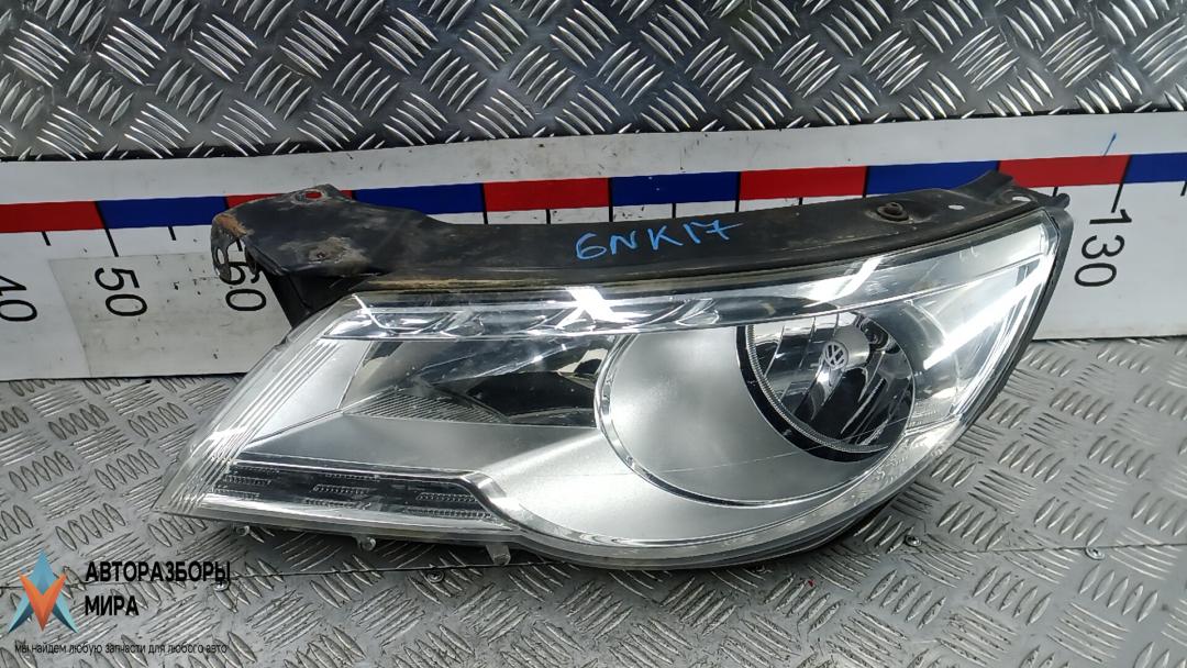 фара левая Volkswagen Tiguan 1 поколение 2009, 2.0 л., дизель, МКПП, внедорожник 5 дв. - фото №1