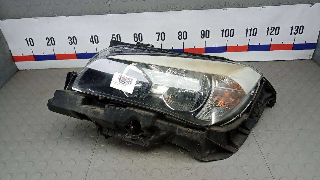 фара левая BMW X1 E84 2010, 2.0 л., дизель, МКПП, внедорожник 5 дв. - фото №1