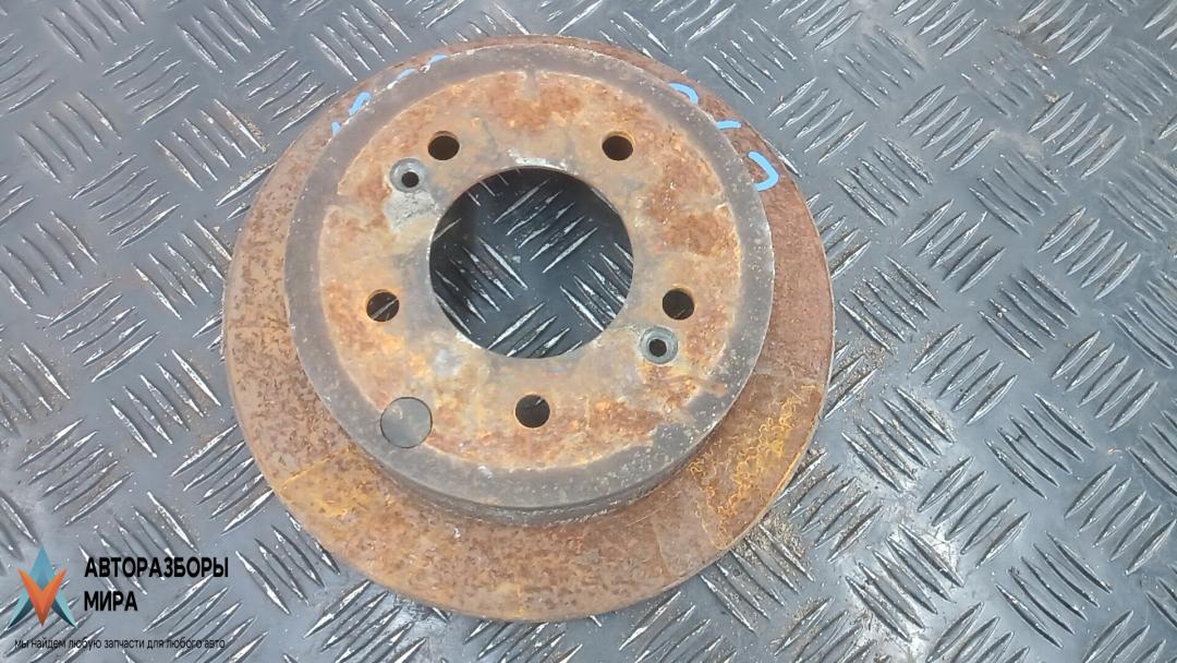 диск тормозной задний Kia Soul 1 поколение 2010, 1.6 л., CRDi 115, дизель, МКПП, хетчбэк 5 дв., 584112K300 - фото №1