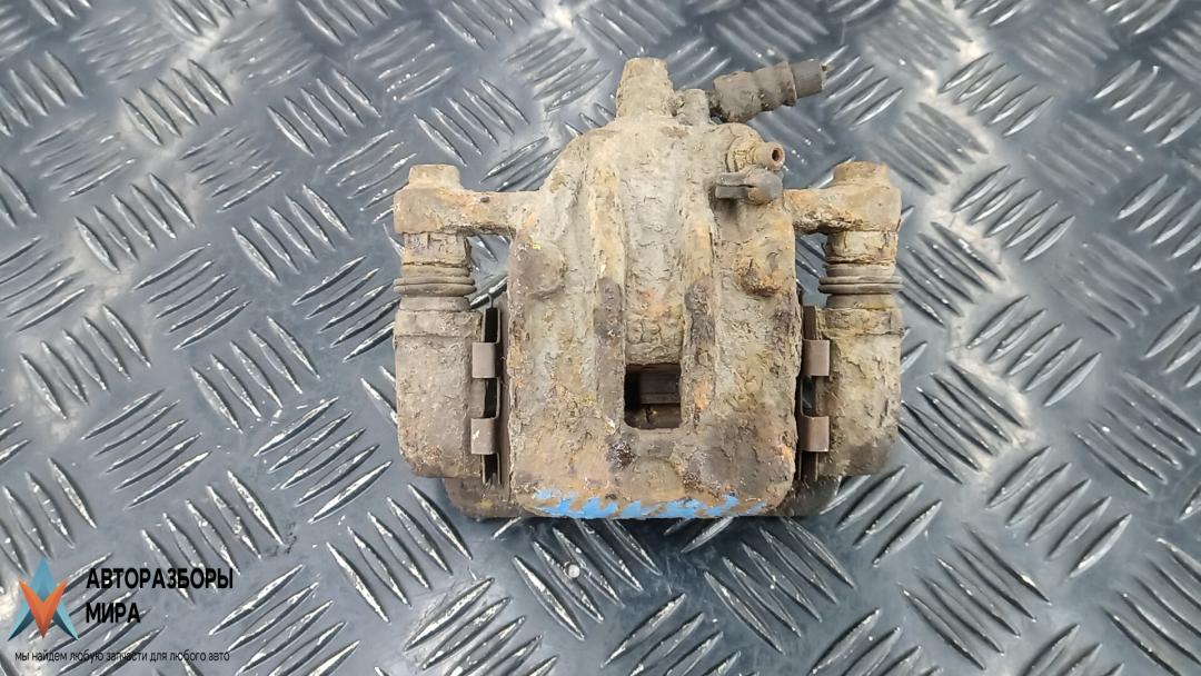 суппорт задний левый Hyundai Tucson 1 поколение 2005, 2.0 л., дизель, МКПП, внедорожник 5 дв., 583102EA10, 582102E300 - фото №1