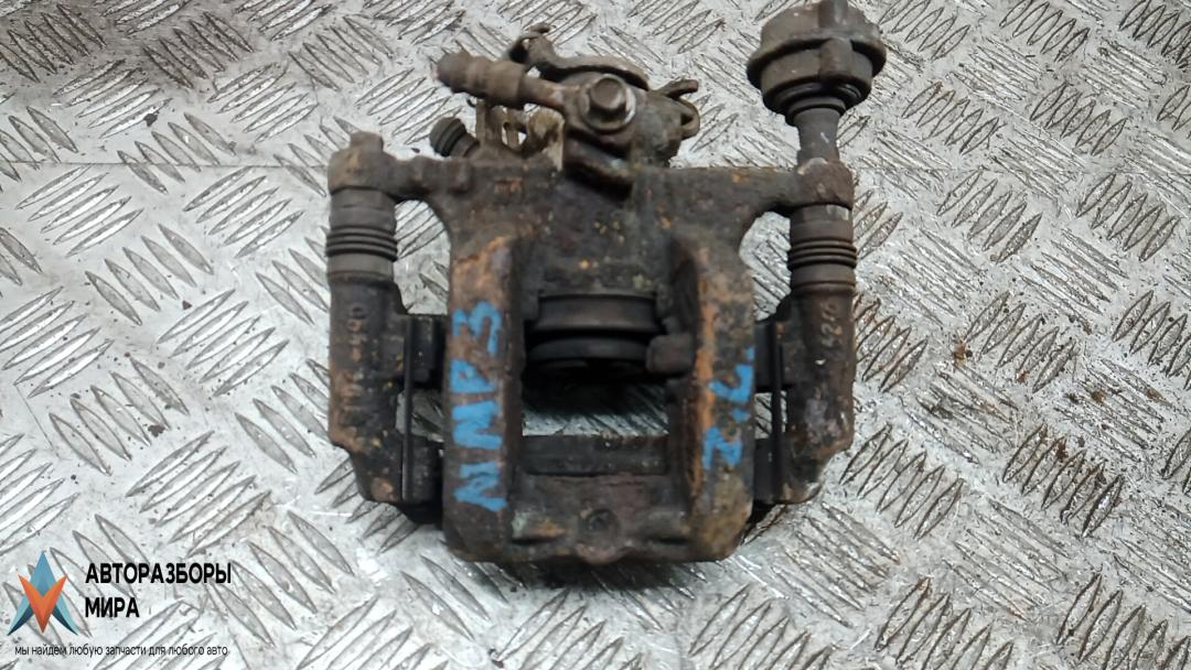 суппорт задний левый Chevrolet Orlando 1 поколение 2011, 1.8 л., бензин, МКПП, минивэн, 13300863 - фото №1