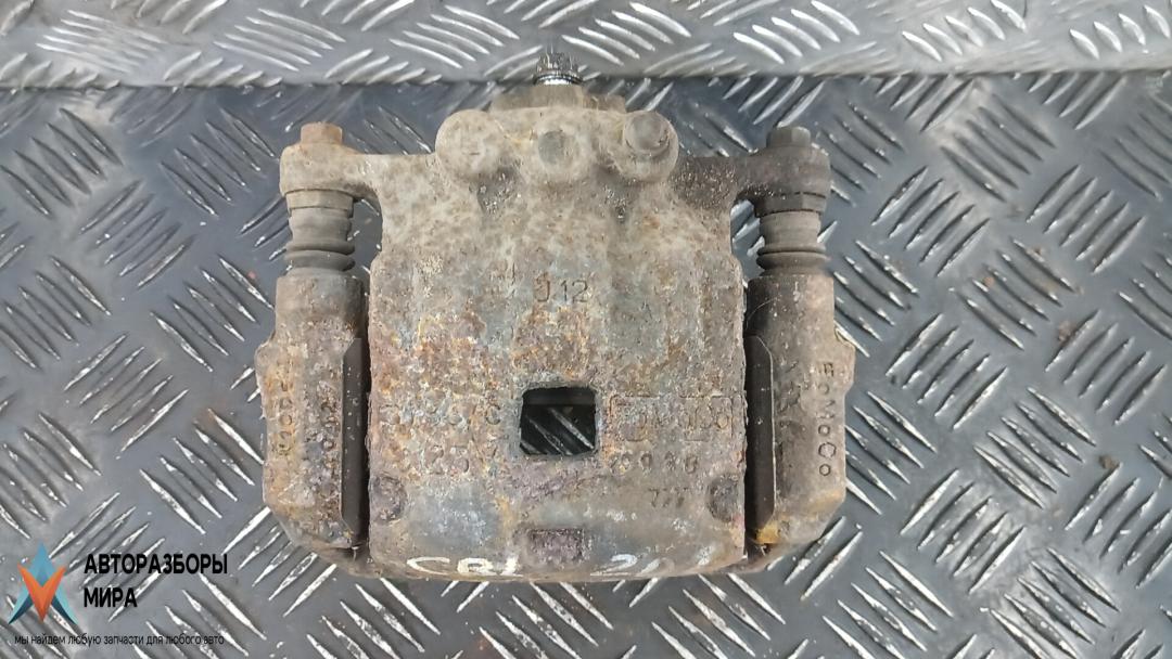 суппорт передний левый Ford Fiesta 6 поколение 2011, 1.6 л., TDCi, дизель, МКПП, хетчбэк 5 дв. - фото №1