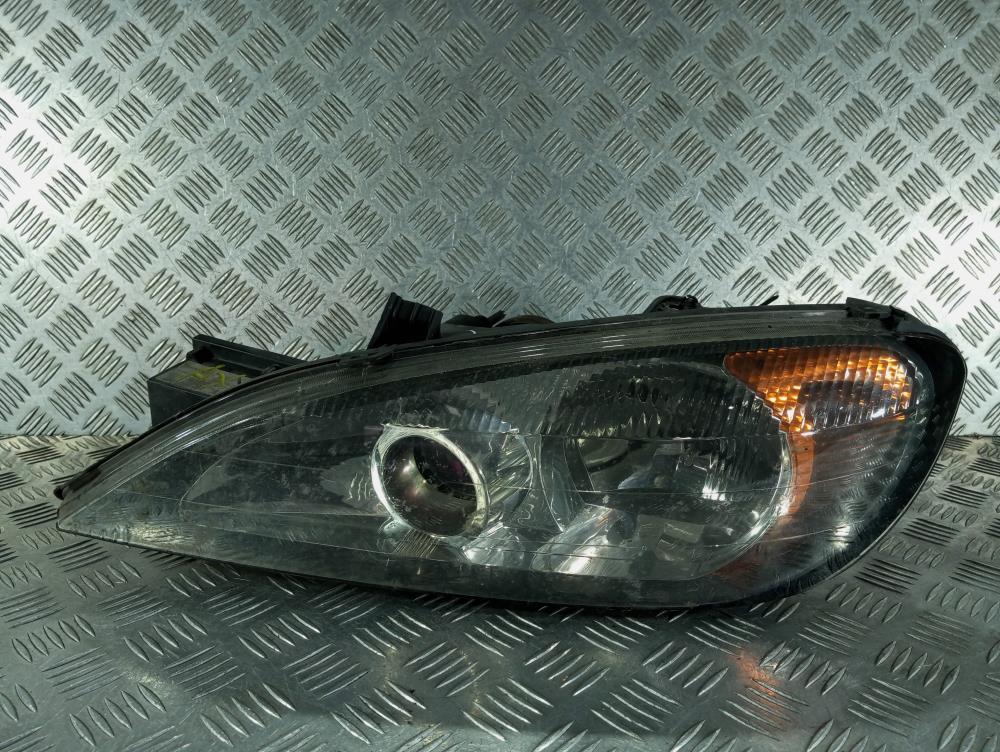 фара левая Nissan Primera P12 2001, цвет, 89003044 - фото №1