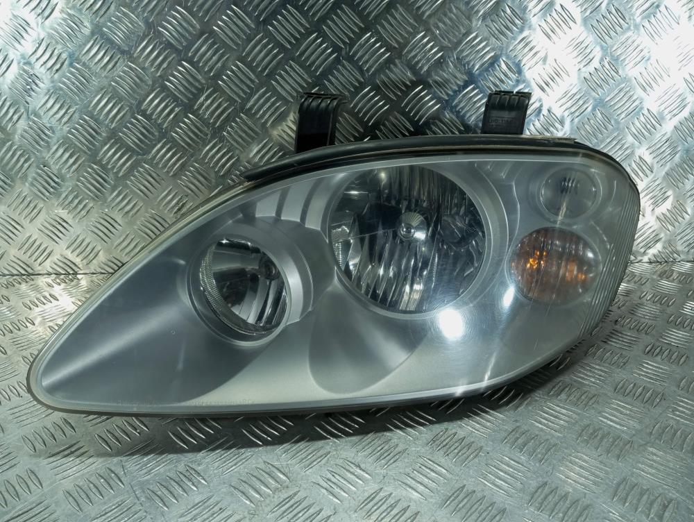 фара левая SsangYong Rodius 1 поколение 2006, цвет - фото №1