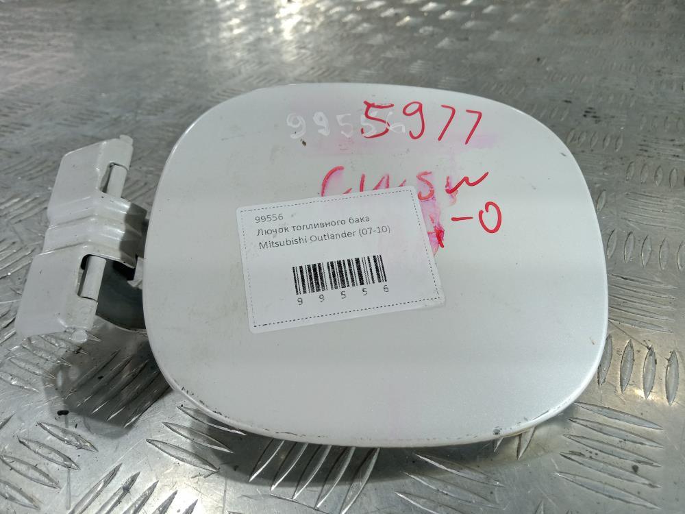 лючок топливного бака Mitsubishi Outlander 2 поколение 2008, цвет - фото №1