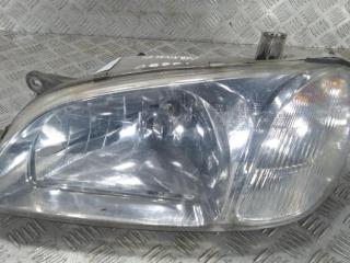 фара левая Kia Carnival UP/GQ [рестайлинг] 2003, цвет