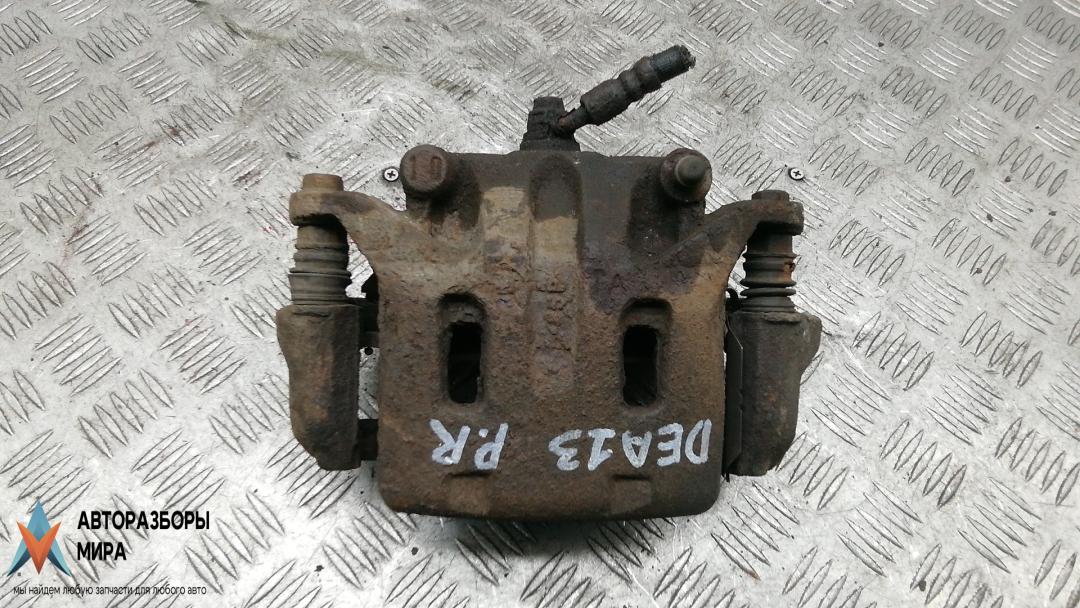 суппорт передний правый Nissan Navara D40 2009, 2.5 л., дизель, МКПП, внедорожник 5 дв. - фото №1