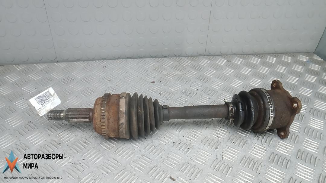 полуось передняя левая (приводной вал, ШРУС) Mitsubishi L200 4 поколение 2007, 2.5 л., дизель, МКПП, пикап - фото №1