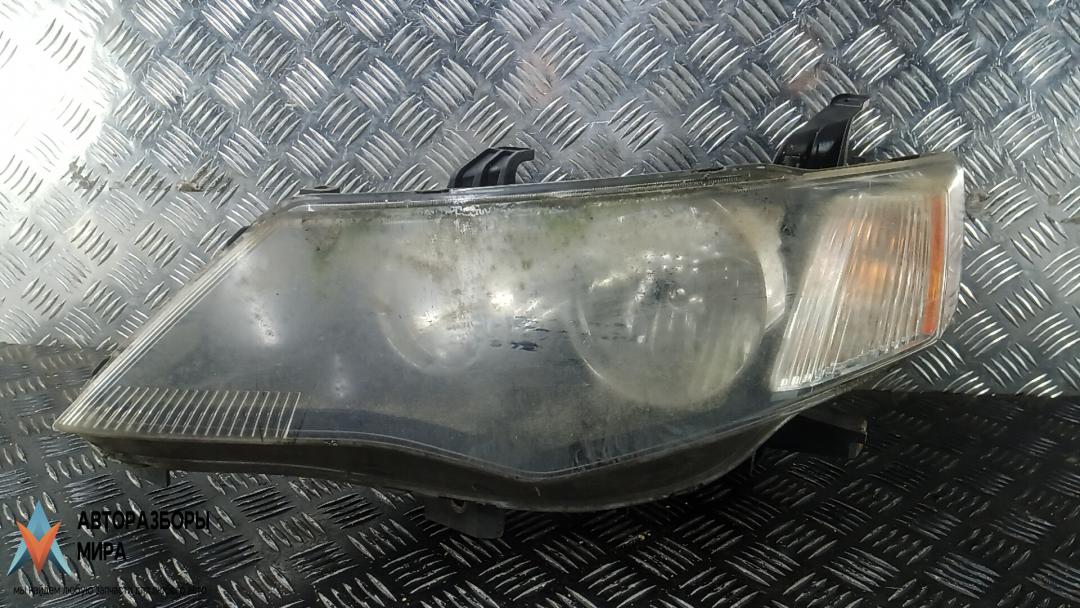 фара левая Mitsubishi Outlander 2 поколение 2007, 2.2 л., дизель, МКПП, внедорожник 5 дв. - фото №1