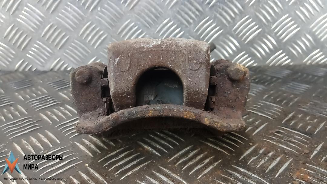 суппорт задний левый Kia Sportage 3 поколение 2013, 1.7 л., дизель, МКПП, внедорожник 5 дв., 582102Y310, 583102YA31 - фото №1