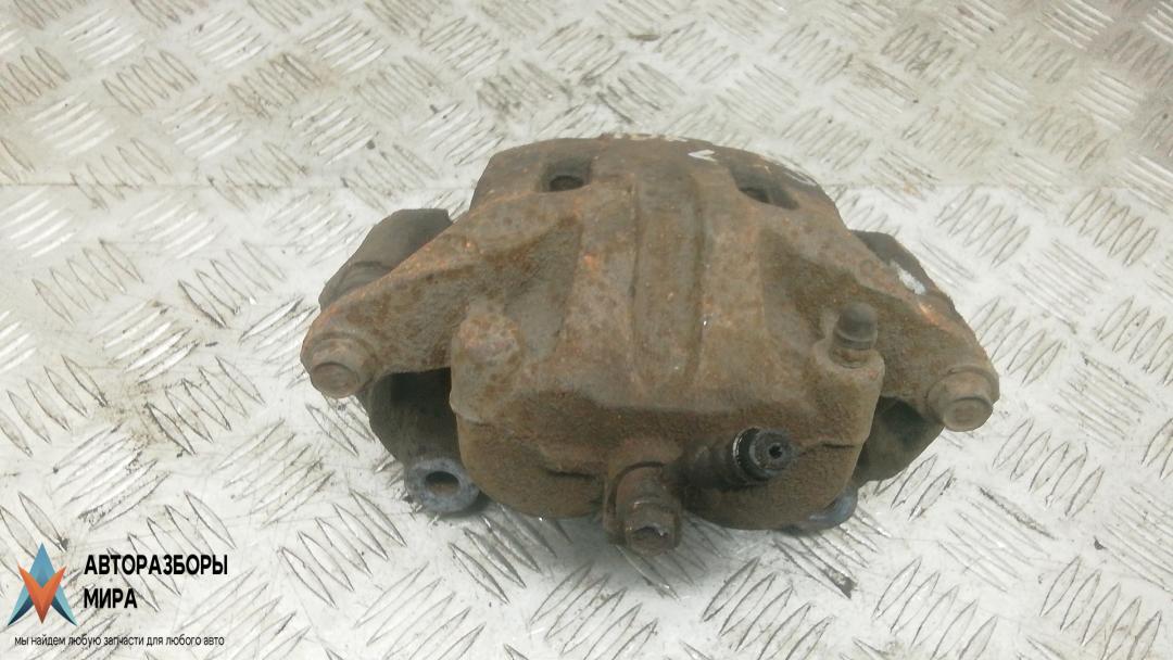 суппорт передний левый Nissan Pathfinder R51 2006, 2.5 л., дизель, МКПП, внедорожник 5 дв., 41011EB32A - фото №1