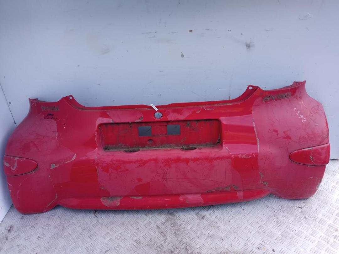 бампер задний Toyota Aygo 2006, красный, хетчбэк 3 дв., 521590H030