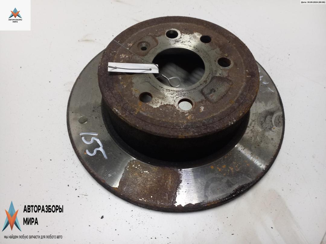 диск тормозной задний Opel Vectra B 1997, 1.8 л., бензин, АКПП, бежевый, седан - фото №1