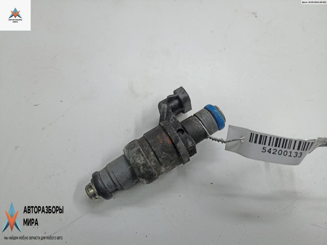 форсунка Opel Zafira 1 поколение (A) 2001, 2.2 л., бензин, МКПП, синий, минивэн, 12569091 - фото №1