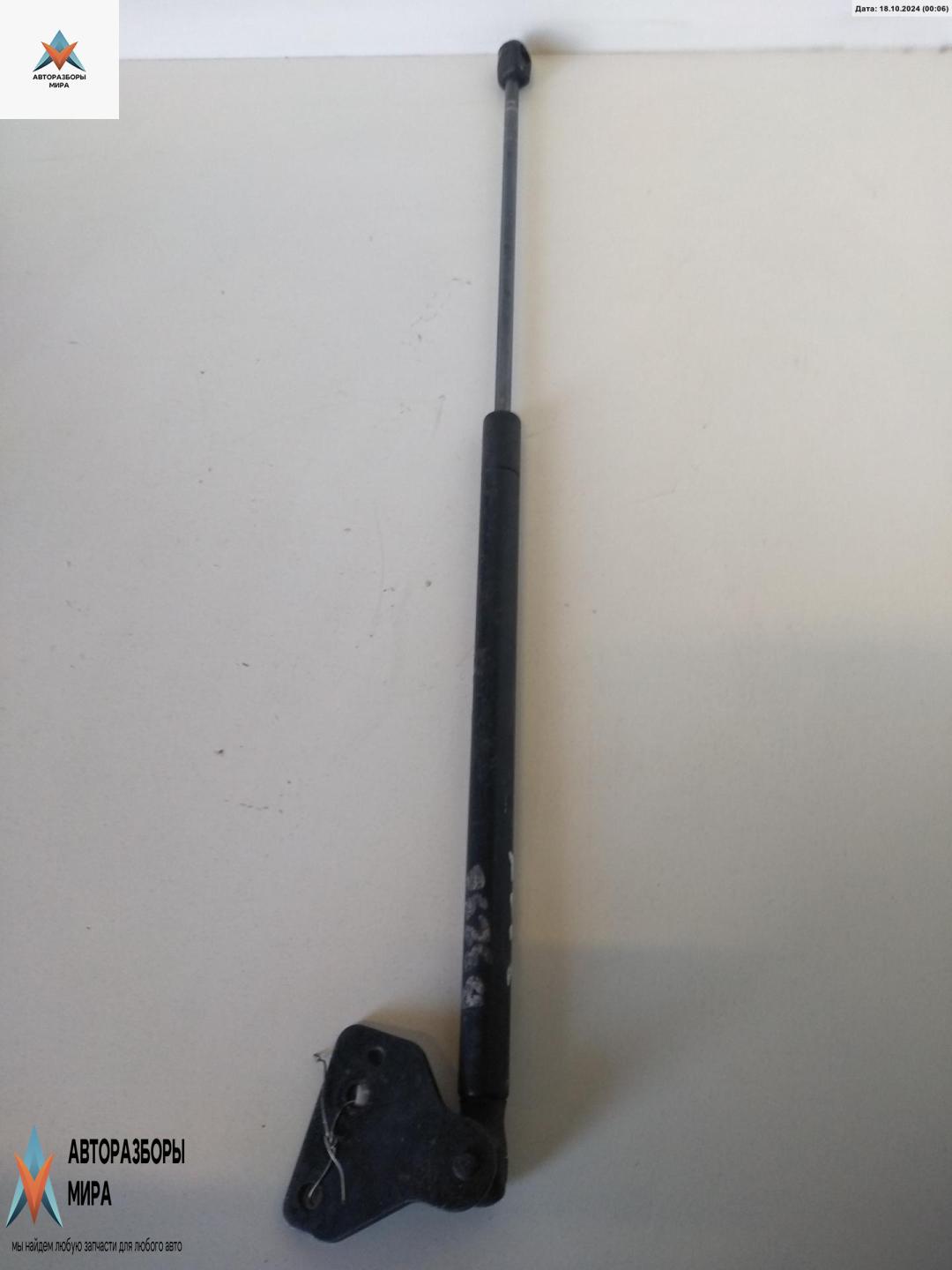 амортизатор крышки багажника (3-5 двери) Ford Focus 2 поколение 2005, 1.8 л., дизель, МКПП, синий, универсал, 4M51N406A10AD - фото №1