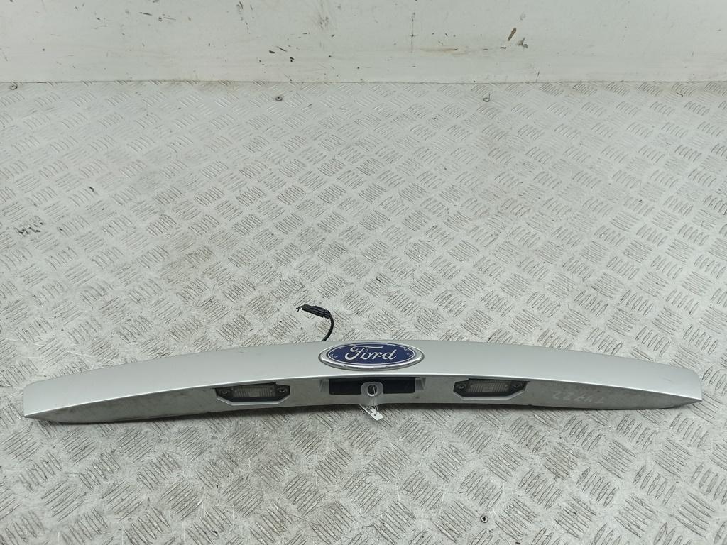 накладка подсветки номера Ford Mondeo 3 поколение 2001, 2.0 л., бензин, МКПП, серый, хетчбэк 5 дв., 1S71F33400AE - фото №1