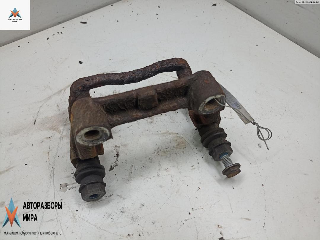 скоба суппорта Opel Astra G 2002, 1.6 л., бензин, МКПП, синий, универсал - фото №1