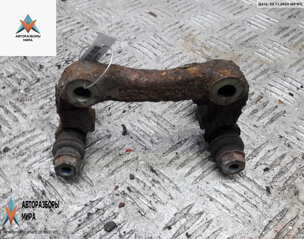 скоба суппорта Volkswagen Golf 4 поколение 1999, 1.6 л., бензин, МКПП, красный, хетчбэк 3 дв., 6Q0615425A - фото №1