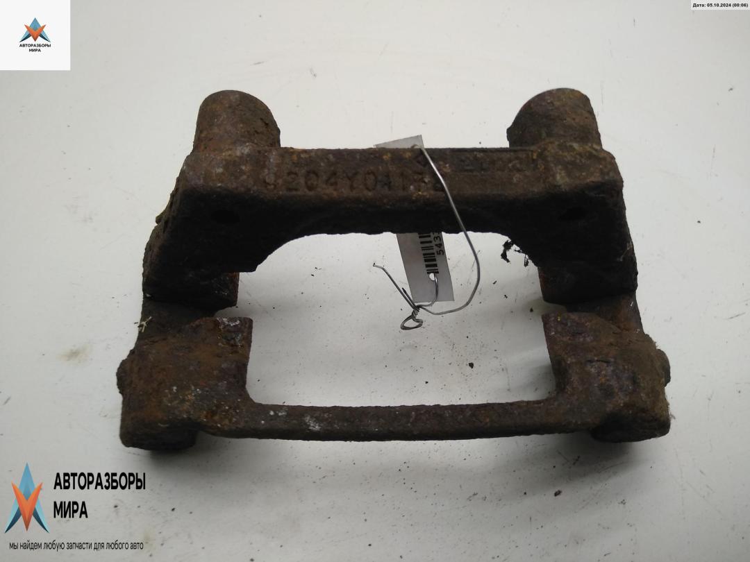 скоба суппорта Ford Mondeo 3 поколение 2002, 2.0 л., дизель, МКПП, зелёный, универсал - фото №1