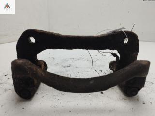 скоба суппорта Mitsubishi Colt 5 поколение (CJO) 1999, 1.3 л., бензин, МКПП, синий, хетчбэк 3 дв.