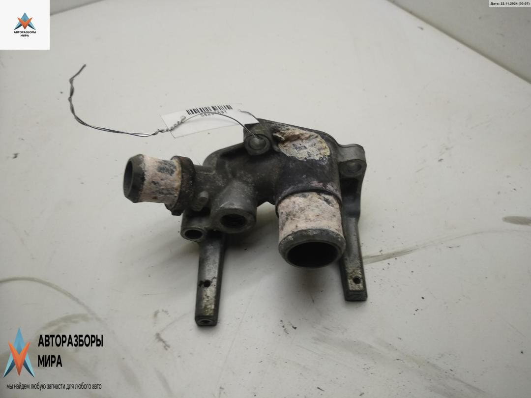 корпус термостата Ford Fiesta 5 поколение 2003, 1.3 л., бензин, МКПП, серый, хетчбэк 5 дв., 1N1G8594 - фото №1