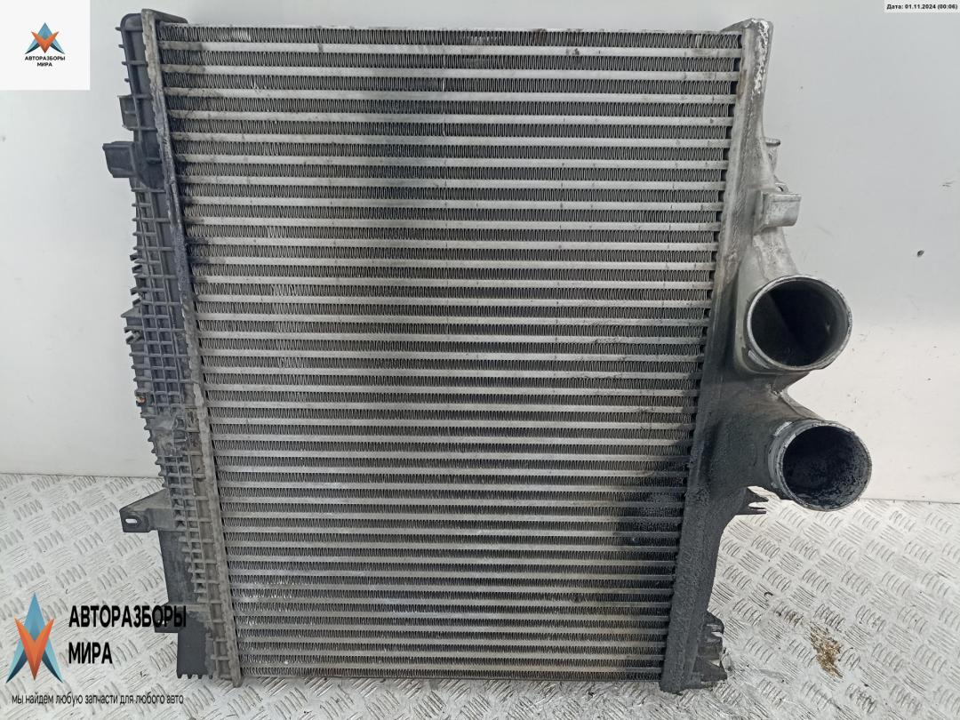 радиатор интеркулера Mercedes-Benz Atego 1 поколение 2005, 6.4 л., дизель, АКПП, чёрный, 9735001004 - фото №1