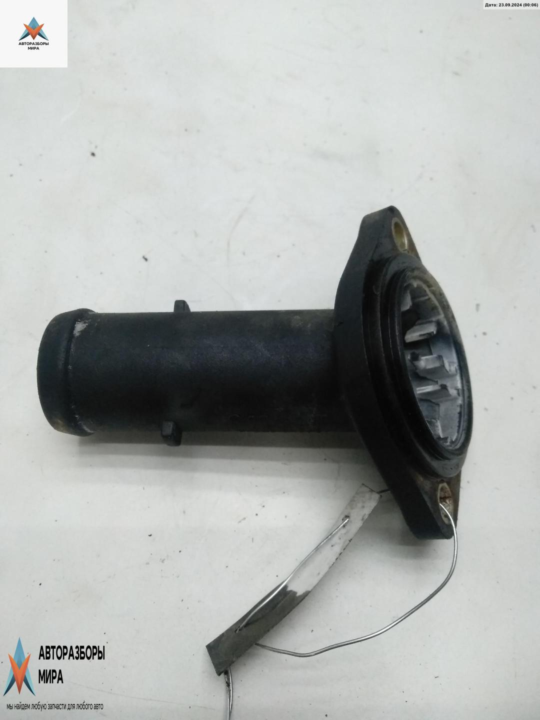 корпус термостата Volkswagen Polo 4 поколение 2002, 1.4 л., дизель, МКПП, чёрный, хетчбэк 5 дв., 045121121A - фото №1