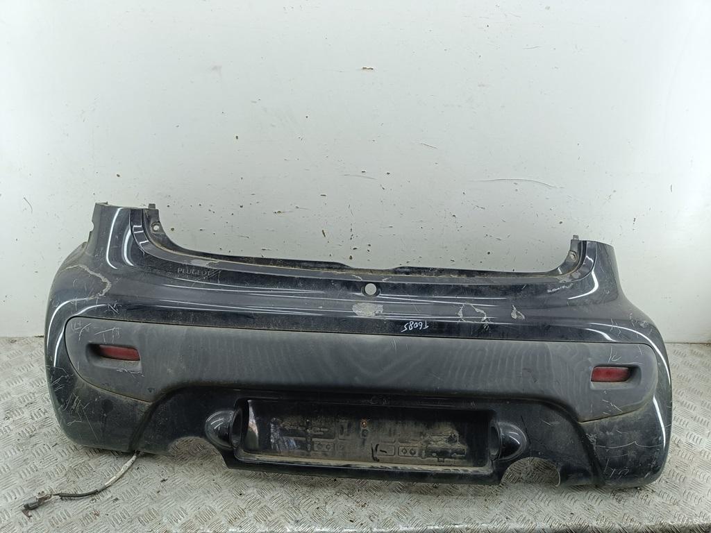 бампер задний Peugeot 107 1 поколение 2005, чёрный, хетчбэк 3 дв., 1601301000 - фото №1