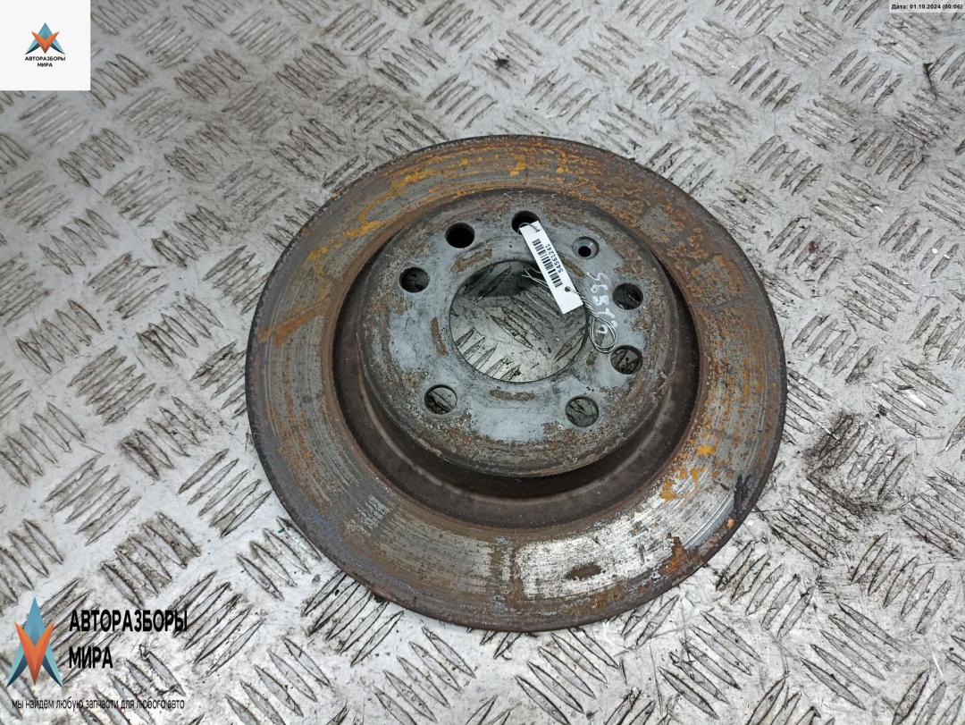 диск тормозной задний Opel Vectra C 2002, 2.2 л., бензин, АКПП, синий, седан - фото №1