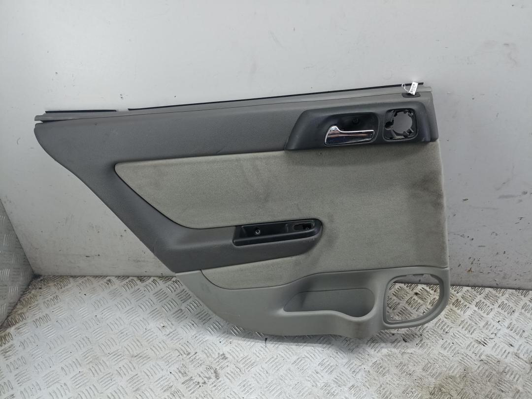 обшивка двери задняя левая Opel Astra G 2002, 2.2 л., бензин, МКПП, серый, хетчбэк 5 дв., 24445461 - фото №1