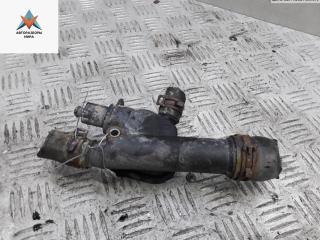 фланец (тройник) системы охлаждения Volkswagen Golf 5 поколение 2005, 1.9 л., дизель, МКПП, серый, хетчбэк 3 дв., 038121132D, BKC