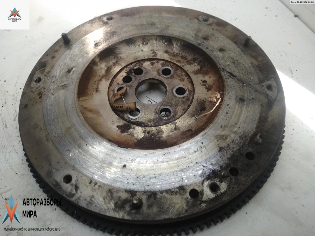 маховик Ford Focus 2 поколение 2006, 1.6 л., i, бензин, МКПП, серый, универсал - фото №1