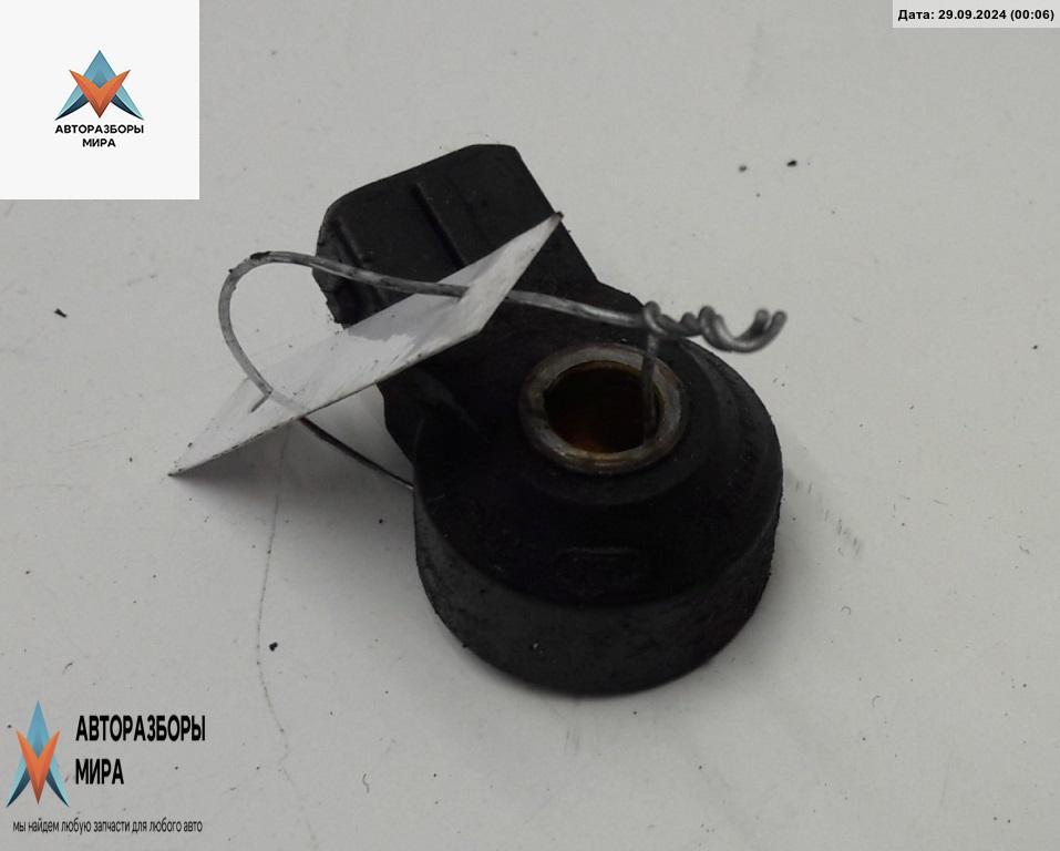 датчик детонации Volkswagen Golf 4 поколение 1999, 1.4 л., бензин, МКПП, чёрный, хетчбэк 3 дв. - фото №1