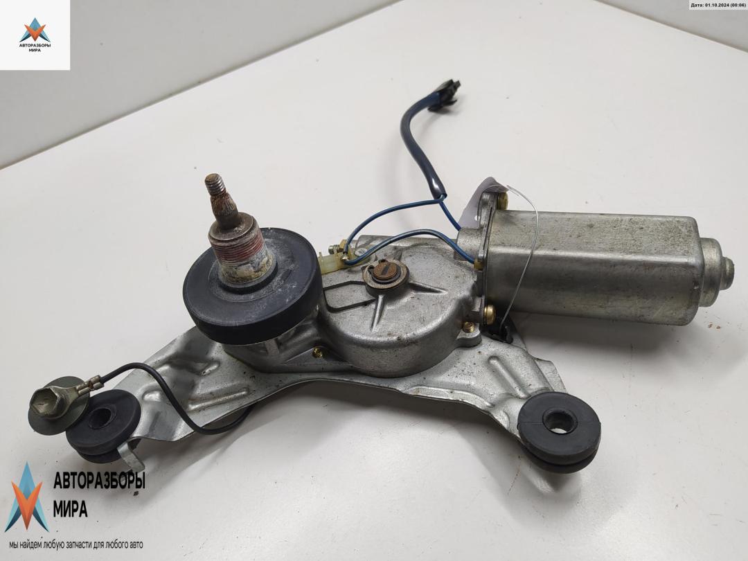 Двигатель стеклоочистителя заднего (моторчик дворников) Mazda 323C BA 1995, 1.5 л., бензин, МКПП, красный, хетчбэк 3 дв. - фото №1