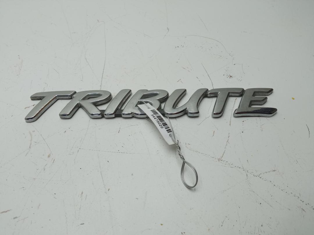 эмблема Mazda Tribute 2003, 2.0 л., бензин, МКПП, серый, внедорожник 5 дв.
