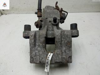 суппорт задний правый Nissan Primera P12 2002, 2.0 л., бензин, МКПП, зелёный, хетчбэк 5 дв.