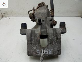 суппорт задний левый Nissan Primera P12 2002, 2.0 л., бензин, МКПП, зелёный, хетчбэк 5 дв.