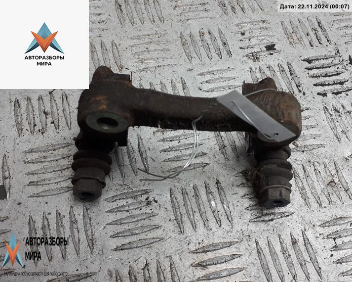 скоба суппорта Volkswagen Golf 4 поколение 2002, 1.9 л., дизель, МКПП, чёрный, хетчбэк 5 дв. - фото №1