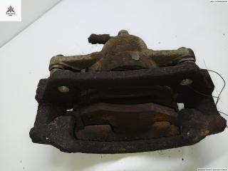 суппорт передний левый Toyota Yaris P1 [рестайлинг] 2003, 1.0 л., бензин, МКПП, серый, хетчбэк 3 дв.