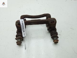 скоба суппорта Toyota Corolla 9 поколение (E120/E130) 2003, 2.0 л., дизель, МКПП, серый, хетчбэк 5 дв.