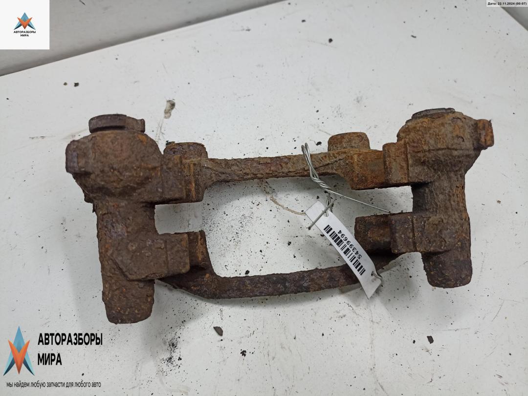 скоба суппорта Opel Zafira 1 поколение (A) 2000, 2.2 л., бензин, МКПП, серый, минивэн - фото №1