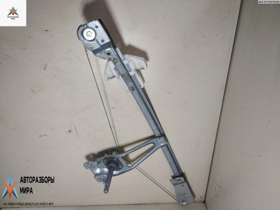 стеклоподъемник задний левый Volkswagen Polo 3 поколение 1998, 1.4 л., бензин, МКПП, синий, хетчбэк 5 дв., 6N4839401A - фото №1