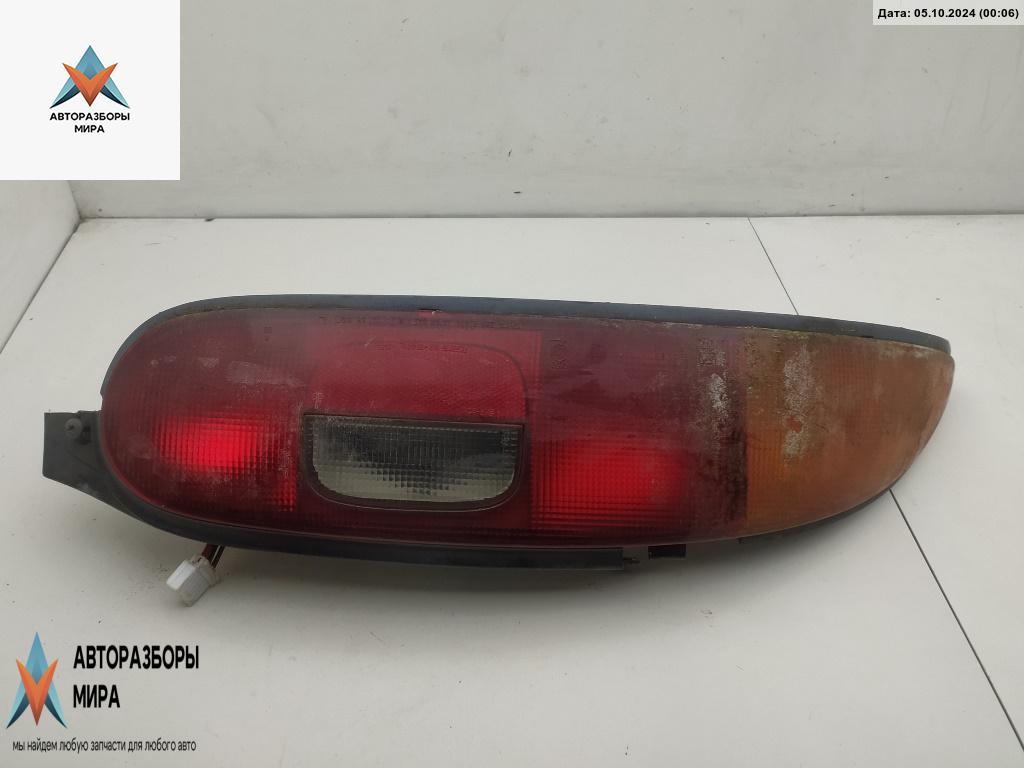фонарь задний левый Mazda MX-3 1 поколение 1997, 1.6 л., бензин, МКПП, серый, купе - фото №1