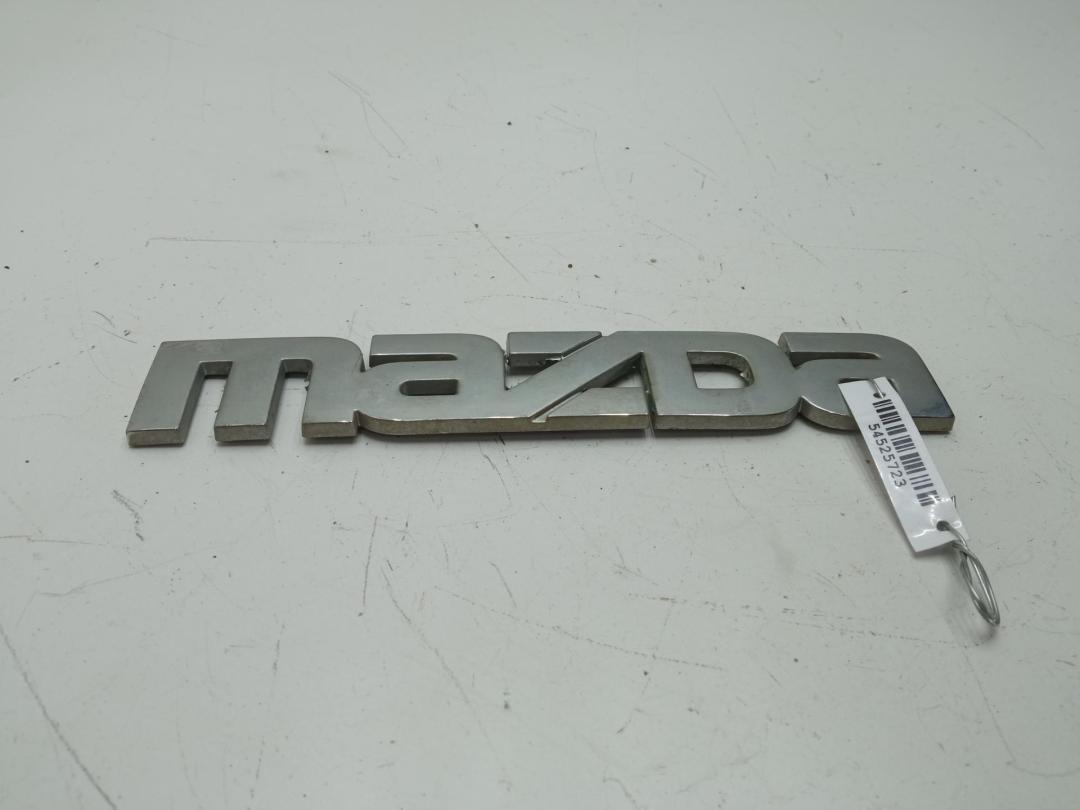 эмблема Mazda Tribute 2001, 2.0 л., бензин, МКПП, серый, внедорожник 5 дв.