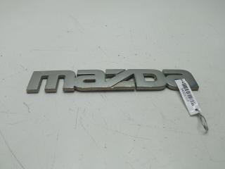 эмблема Mazda Tribute 2001, 2.0 л., бензин, МКПП, серый, внедорожник 5 дв.