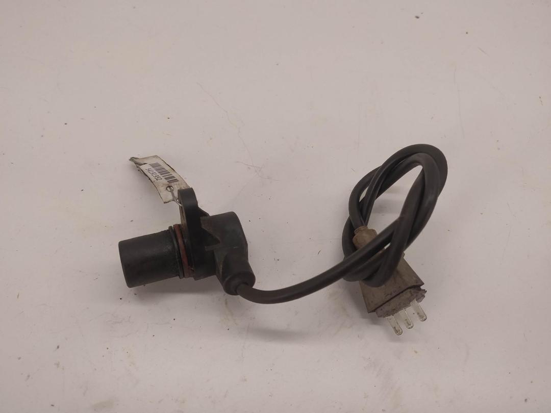 датчик коленвала Volkswagen Passat B5 1998, 1.6 л., бензин, МКПП, чёрный, универсал, 06A90643C - фото №1