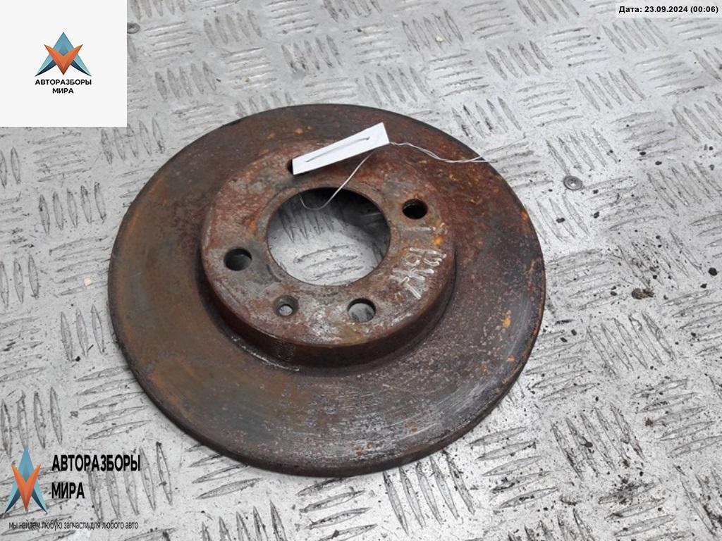 диск тормозной передний Volkswagen Golf 3 поколение 1995, 1.6 л., бензин, МКПП, зелёный, хетчбэк 3 дв. - фото №1