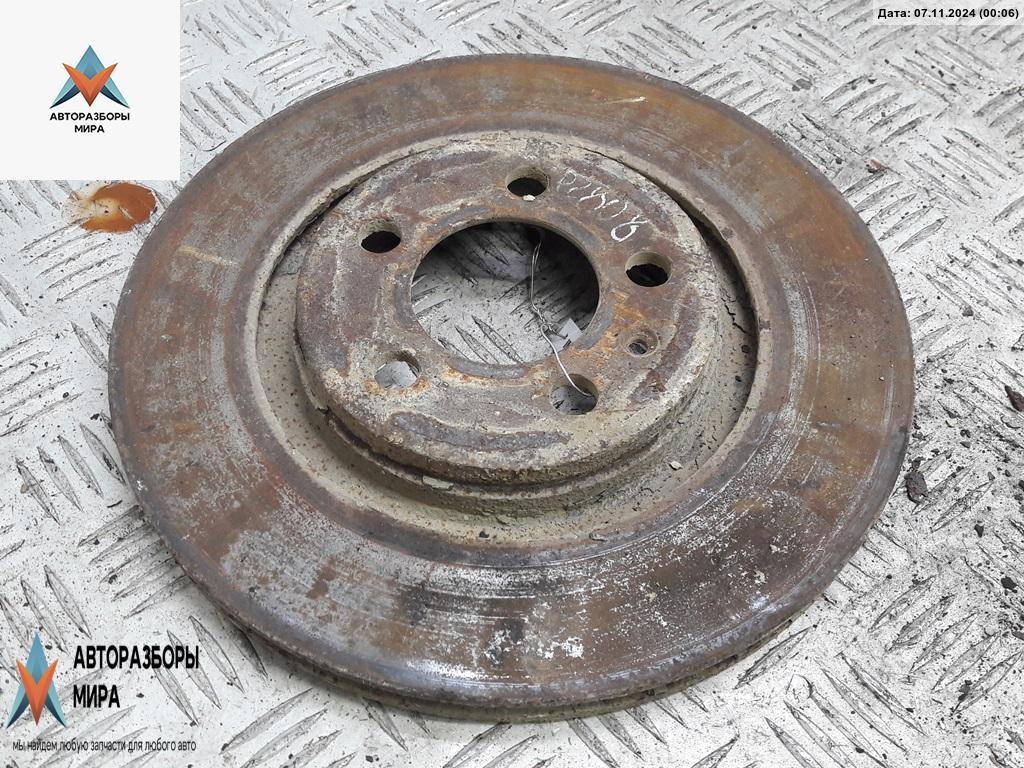 диск тормозной передний Volkswagen Golf 4 поколение 2003, 1.9 л., дизель, МКПП, синий, универсал - фото №1