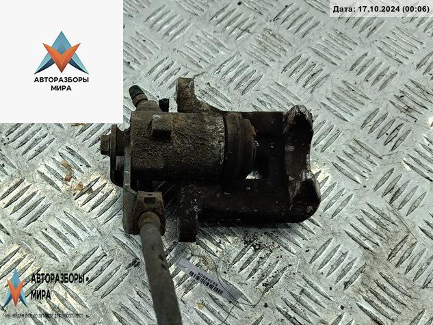 суппорт задний левый Volkswagen Golf 4 поколение 2000, 1.4 л., бензин, МКПП, синий, хетчбэк 5 дв. - фото №1